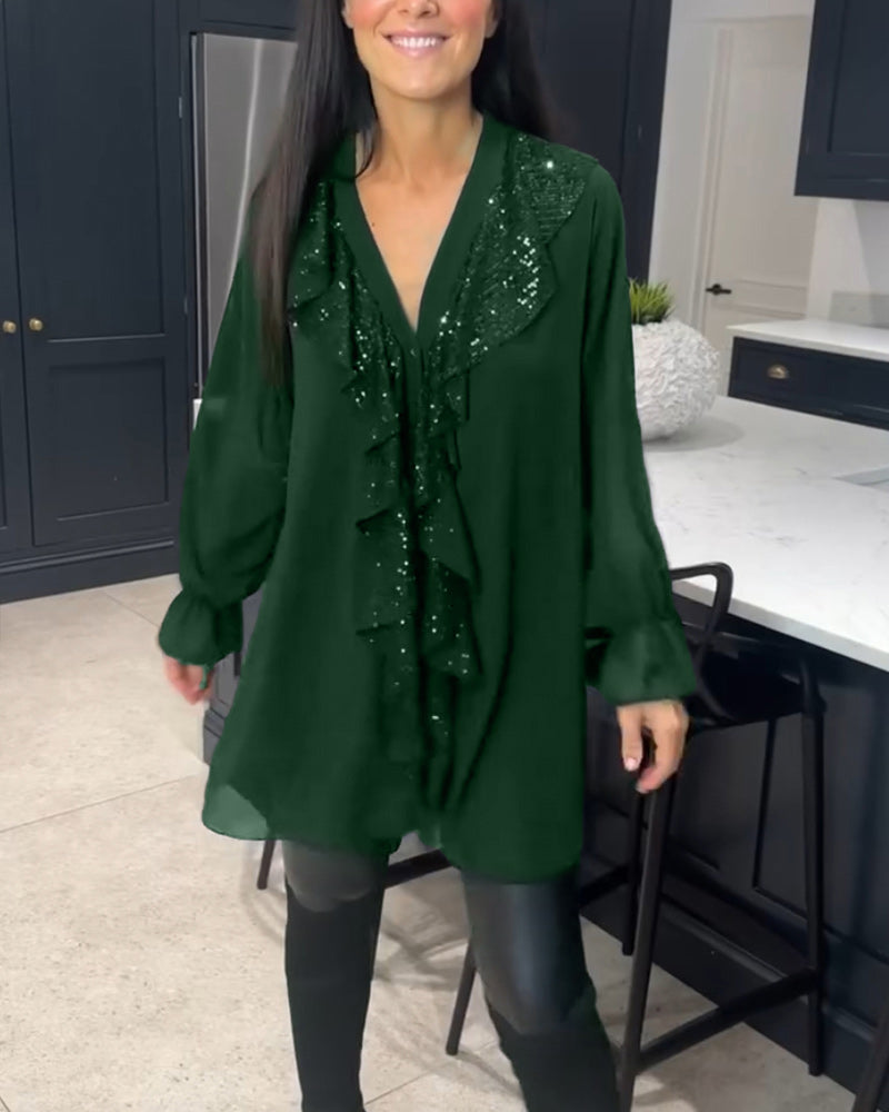 Blus med volanger och elegant stil