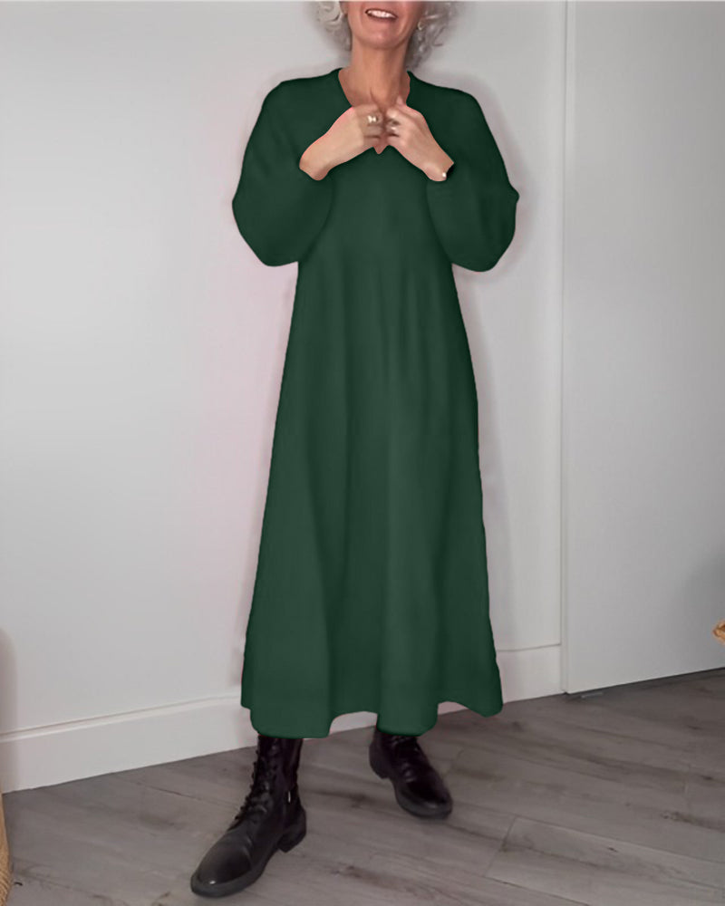 V-ringad Elegant klänning med långa ärmar
