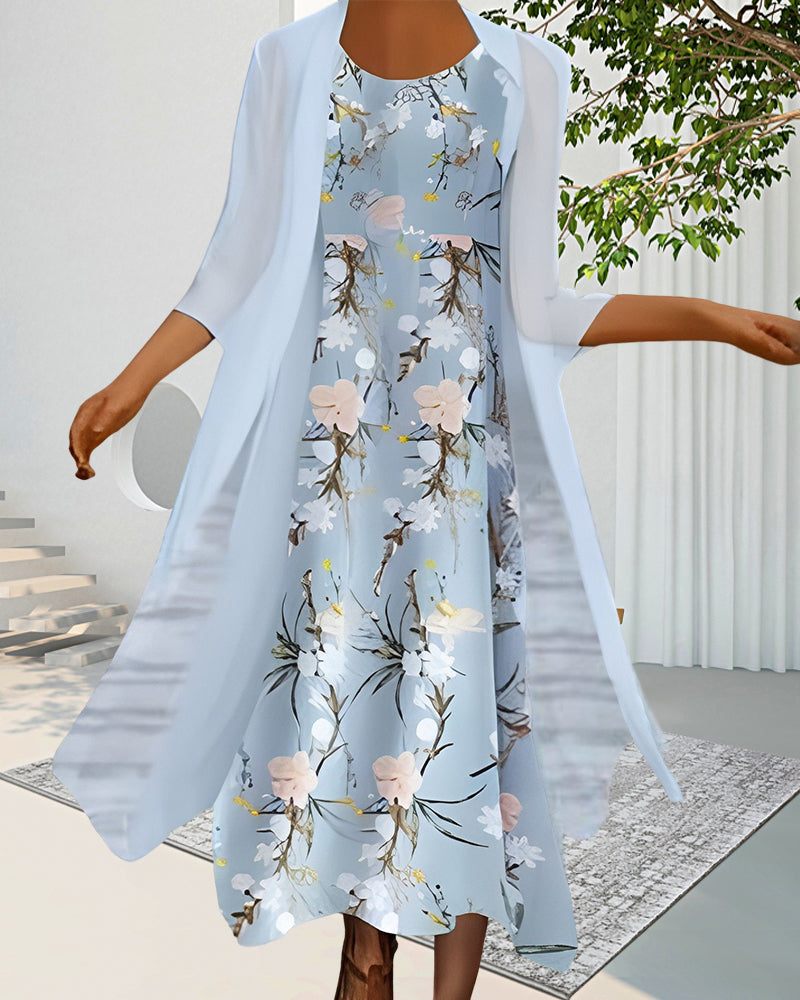 Klänning med 3/4-ärm och blommönster
